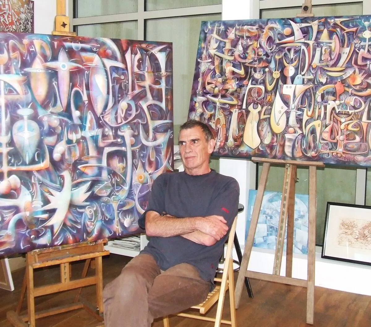 Portrait of the Artist with Paintings